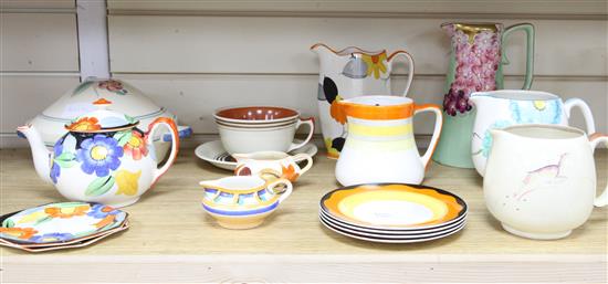 A collection of mixed 1930s and late Susie Cooper, Grays and Burslem jugs etc
